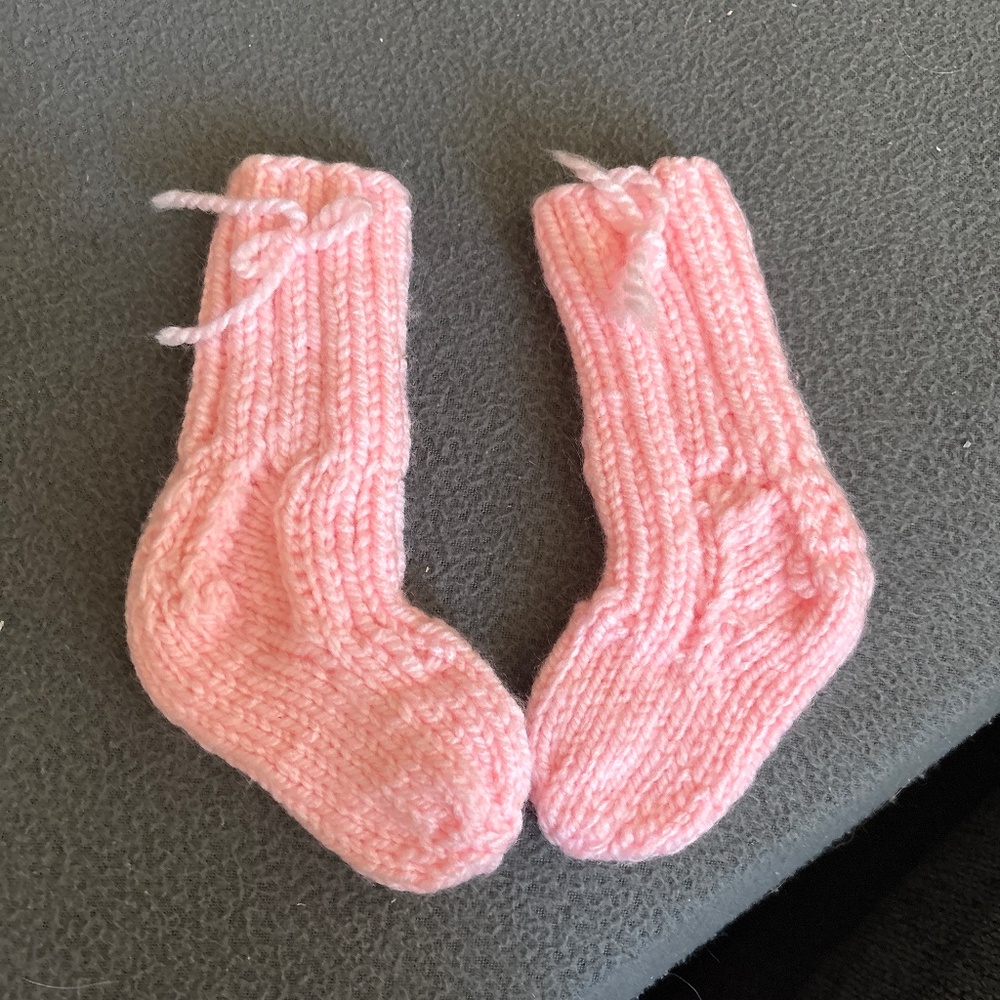 Handmade pink baby girl socks with bow